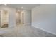 Neutral bedroom with plush carpet, recessed lighting, and ensuite bath access at 42 Avian Way # 128B, Auburn, GA 30011