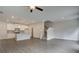 Kitchen with island, stainless appliances, and hardwood flooring at 42 Avian Way # 128B, Auburn, GA 30011