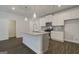 Kitchen with stainless steel appliances and island at 42 Avian Way # 128B, Auburn, GA 30011