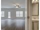 Bright living room boasts hardwood floors, large windows, and an open layout at 42 Avian Way # 128B, Auburn, GA 30011