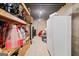 Unfinished basement with shelving and ample storage space at 99 Landers Ne Rd, Rydal, GA 30171