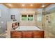 Bathroom featuring a bathtub, walk in shower and built-in storage at 99 Landers Ne Rd, Rydal, GA 30171