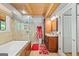 Bathroom with separate soaking tub, walk-in shower, and elegant finishes at 99 Landers Ne Rd, Rydal, GA 30171
