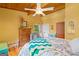 This naturally lit bedroom features wood floors, wood ceilings, and plenty of windows at 99 Landers Ne Rd, Rydal, GA 30171