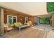 Spacious covered deck featuring comfortable seating and a relaxing ambiance at 99 Landers Ne Rd, Rydal, GA 30171