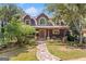Charming two-story home with a well-maintained front yard and a stone pathway at 99 Landers Ne Rd, Rydal, GA 30171