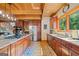 Gourmet kitchen with a large island, granite countertops, stainless appliances, and custom cabinets at 99 Landers Ne Rd, Rydal, GA 30171