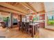 The kitchen features a large island with seating, stainless appliances, and wood ceiling at 99 Landers Ne Rd, Rydal, GA 30171