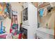 Efficient laundry room features stacked washer/dryer and utility sink for added convenience at 99 Landers Ne Rd, Rydal, GA 30171