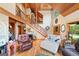 Spacious living room with hardwood floors, wood staircase and lots of natural light at 99 Landers Ne Rd, Rydal, GA 30171