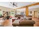 Spacious living room featuring a wood-burning stove, concrete floors, and wooden support beams at 99 Landers Ne Rd, Rydal, GA 30171