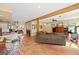Spacious living area with exposed beams, a comfortable sofa, and eclectic decor at 99 Landers Ne Rd, Rydal, GA 30171
