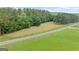 Tranquil shot of the expansive property and lush green fields at 99 Landers Ne Rd, Rydal, GA 30171