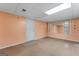 Unfinished basement area featuring a door, window, and carpet-free flooring at 520 Lakecourt Dr, Mcdonough, GA 30253