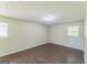 Bedroom featuring hardwood floors, recessed lighting, and a bright window at 195 Southmoor Cir, Stockbridge, GA 30281