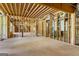 Unfinished basement with wooden framing and exposed beams offers customization potential and ample space at 100 Regina Ct, Fayetteville, GA 30215