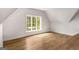 Bright, spacious bedroom with hardwood floors and large window offering scenic views at 100 Regina Ct, Fayetteville, GA 30215