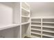 Bright walk-in closet with custom shelving and ample storage space at 100 Regina Ct, Fayetteville, GA 30215