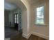 Foyer view with window and arched doorway at 100 Regina Ct, Fayetteville, GA 30215