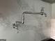 Close-up of a stylish kitchen featuring a modern faucet and quartz backsplash at 100 Regina Ct, Fayetteville, GA 30215
