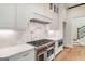 Elegant kitchen featuring stainless steel appliances and pot filler for added convenience at 100 Regina Ct, Fayetteville, GA 30215