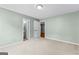 Bedroom with ensuite bathroom and closet access at 810 Bedford Park, Peachtree City, GA 30269