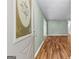 An entryway with light green walls and wood flooring at 810 Bedford Park, Peachtree City, GA 30269