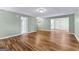 A spacious and open living room with wood floors, featuring a clear view into other rooms at 810 Bedford Park, Peachtree City, GA 30269