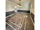 Elegant dining room featuring decorative marble flooring, stylish chandelier, and neutral paint at 107 Terrane Rdg, Peachtree City, GA 30269
