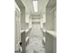 Well-organized walk-in closet with built-in shelving, maximizing storage and providing a tidy space at 107 Terrane Rdg, Peachtree City, GA 30269