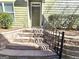 Inviting front entrance with stone steps and wrought iron railing at 2540 leads to front door at 2540 Willow Grove Road Nw Rd # 15, Acworth, GA 30101