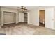 Spacious bedroom featuring two large closets and neutral carpeting throughout at 2624 Windridge Dr, Acworth, GA 30102