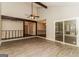 Open living space with vaulted ceilings, hardwood floors, and lots of natural light at 2624 Windridge Dr, Acworth, GA 30102