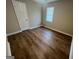 Bedroom with window and ceiling fan at 260 Countryside Ln, Covington, GA 30016