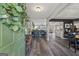 Welcoming foyer with wood floors leading into living spaces, showcasing an open floor plan at 301 Bradford Ct, Auburn, GA 30011