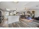 Open concept living area, connects living room, kitchen, dining, and other rooms at 301 Bradford Ct, Auburn, GA 30011