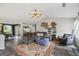 Spacious living room with an area rug, vaulted ceilings, and seamless access to other areas at 301 Bradford Ct, Auburn, GA 30011