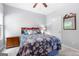 Bedroom with a comfortable bed, soft lighting, with a neutral color scheme create a serene and relaxing atmosphere at 8 Saint Charles Ave, Sharpsburg, GA 30277