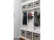 Organized mudroom with built-in storage, ideal for keeping things tidy and in their place at 8 Saint Charles Ave, Sharpsburg, GA 30277