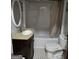 Cozy bathroom featuring a vanity, toilet, and a shower with a shower curtain at 953 South Ave, Forest Park, GA 30297