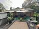 Outdoor deck with ample seating area under gazebo at 6884 Shangrila Way, Riverdale, GA 30296