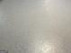Epoxy flooring with a subtle, speckled design enhances the durability and look of the basement space at 6884 Shangrila Way, Riverdale, GA 30296