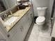 Bathroom with granite countertops, white cabinets and trim plus updated fixtures at 6884 Shangrila Way, Riverdale, GA 30296
