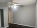 Bedroom with ceiling fan and hardwood flooring at 6884 Shangrila Way, Riverdale, GA 30296