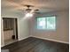 Bedroom with natural light from window and hardwood flooring at 6884 Shangrila Way, Riverdale, GA 30296