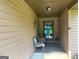 Welcoming front porch with seating, perfect for enjoying the outdoors and greeting guests at 6884 Shangrila Way, Riverdale, GA 30296