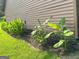 Lush landscaping with leafy plants along exterior of home at 6884 Shangrila Way, Riverdale, GA 30296
