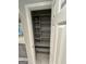 Walk-in pantry with well-placed shelving for efficient storage at 6884 Shangrila Way, Riverdale, GA 30296