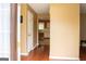 Inviting entryway with wood floors and a view into the dining room at 3255 Hunters Crossing Pt, Lithonia, GA 30038