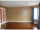 Neutral living room with wood floors and French doors at 3255 Hunters Crossing Pt, Lithonia, GA 30038